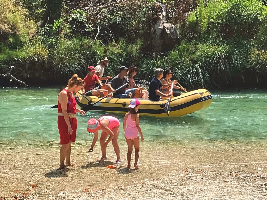 Family enjoying the Acheron River